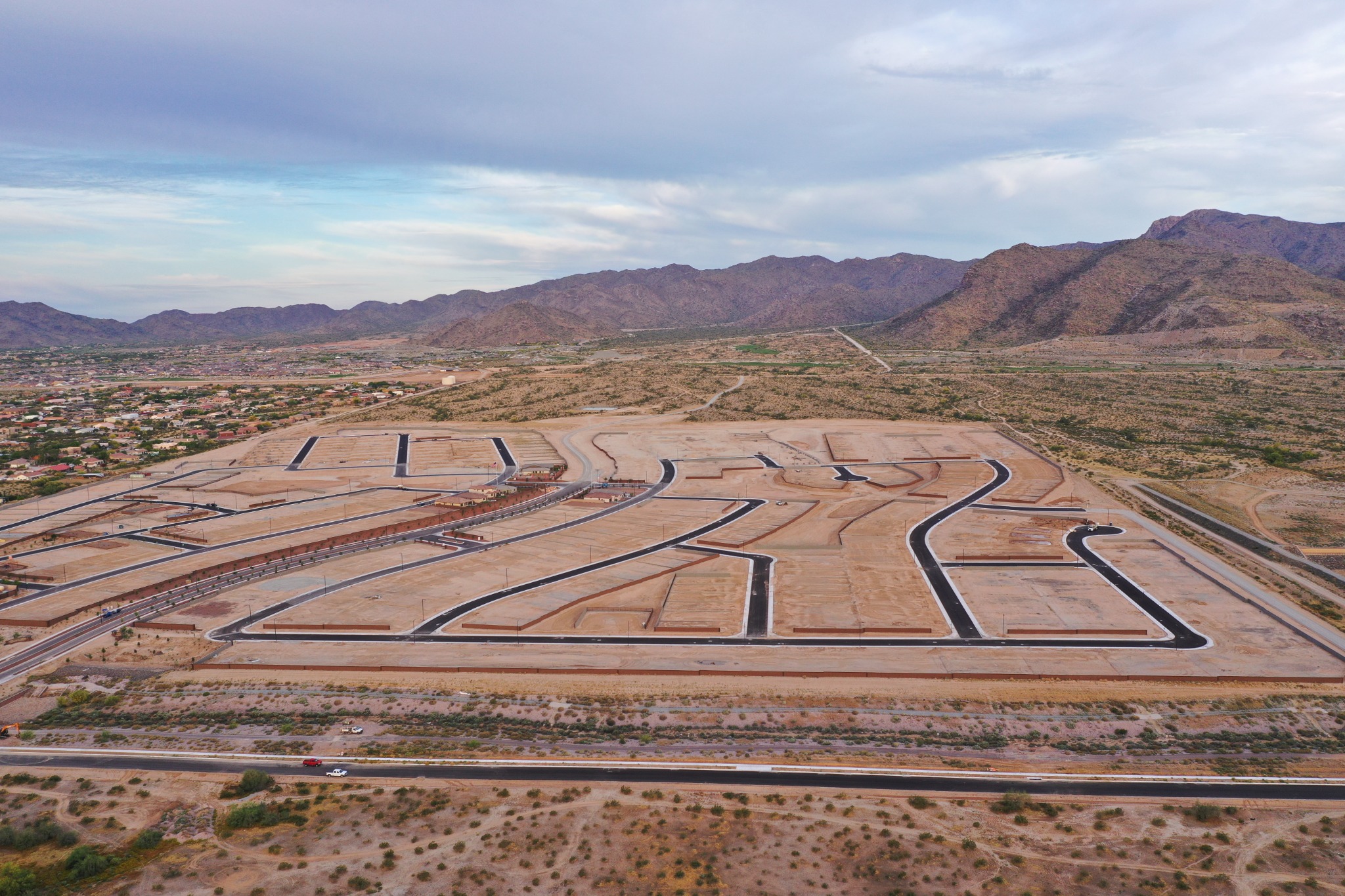 Aerial view of graded residential development with paved streets
