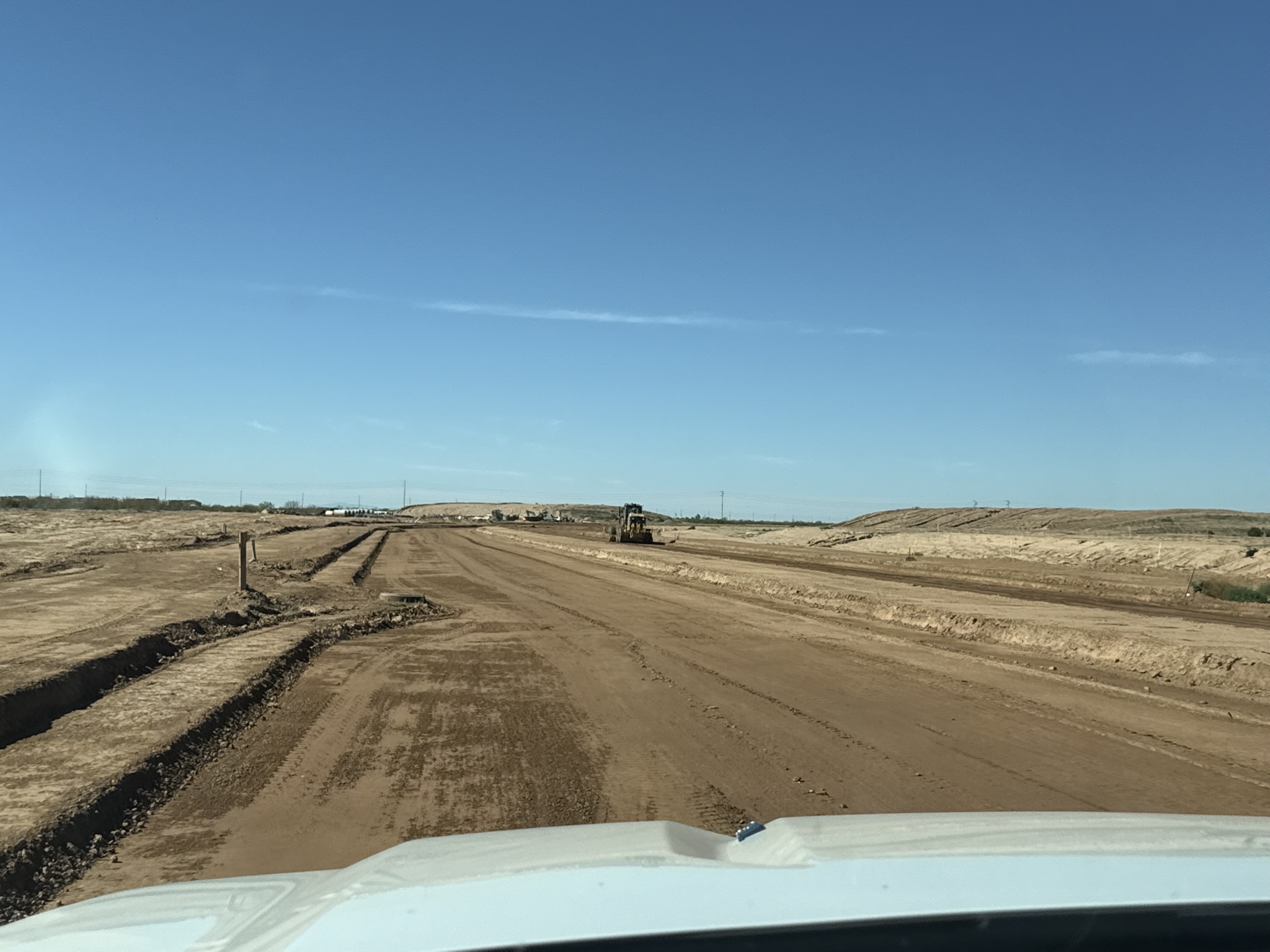 Finish-graded roadway at an Arizona construction site