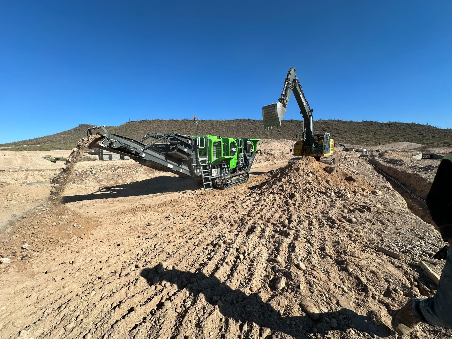Heavy civil excavating equipment at work
